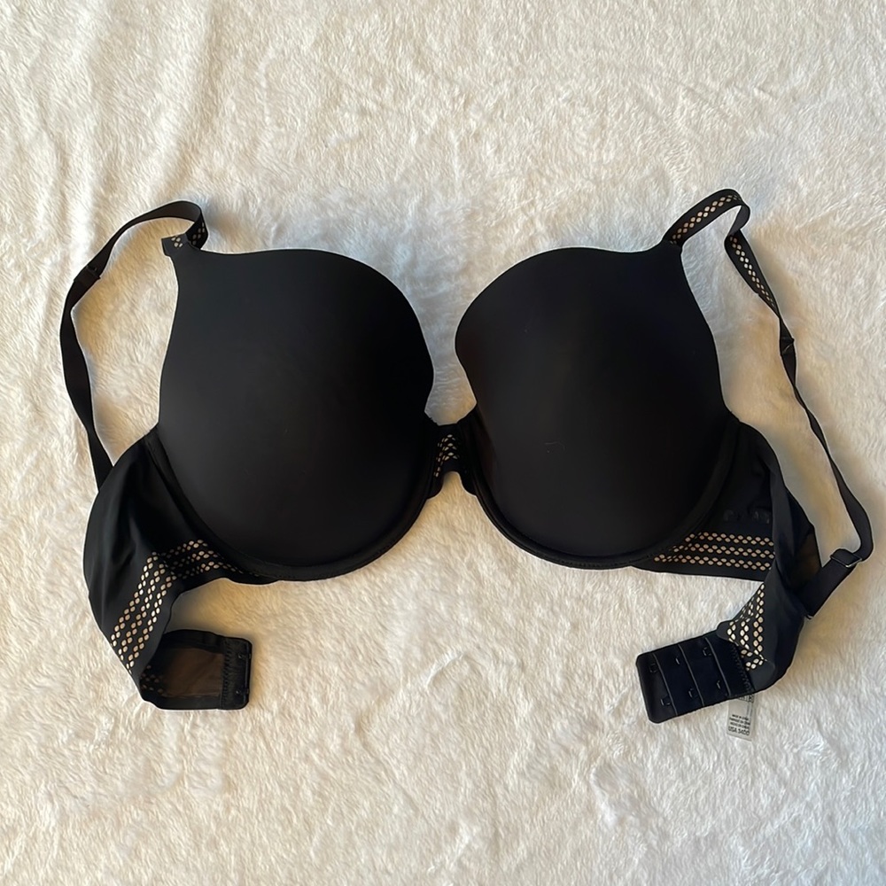 DKNY black bra with cute cream design.